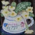 Primroses in jug