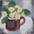 Primroses in mug